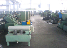 磁輥紙帶過(guò)濾機(jī)使用在減震器公司叉桿車間無(wú)心磨工作現(xiàn)場(chǎng)